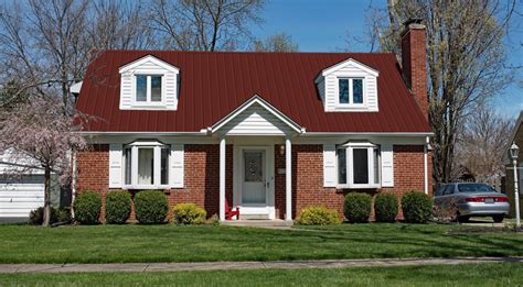 burgundy metal roof on red brick house|rustic red metal roof.